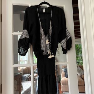 Black swimsuit cover-up by Cool Change with white embroidery. Size M. NWOT.